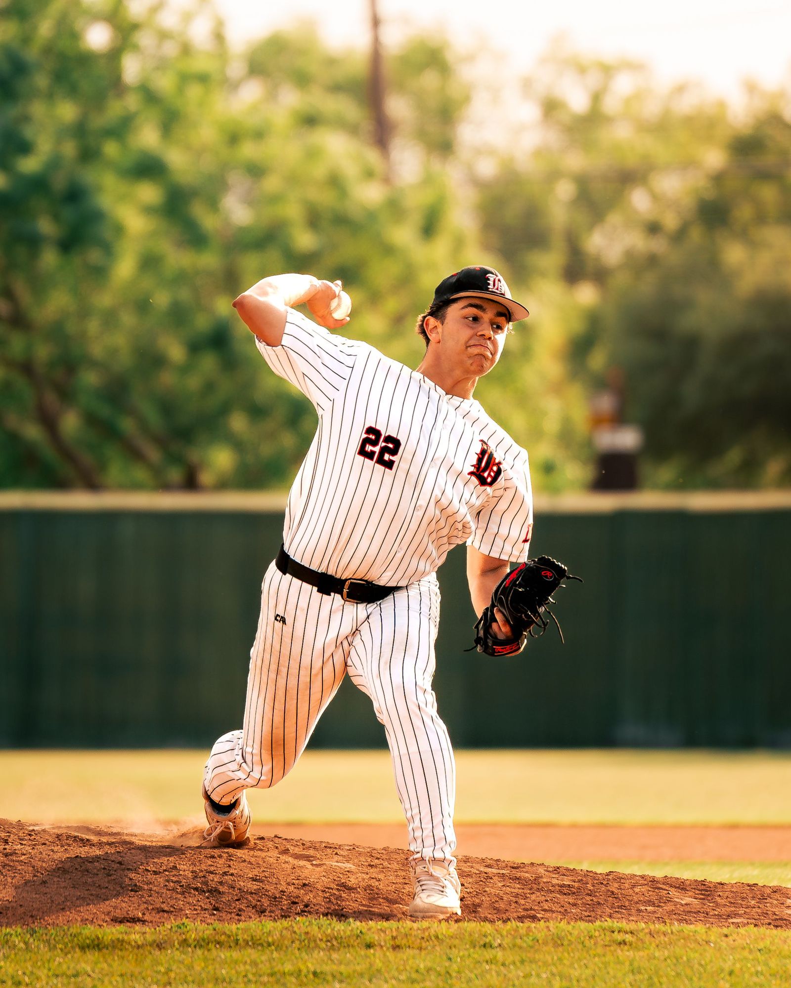 Bowie pitcher mid-delivery