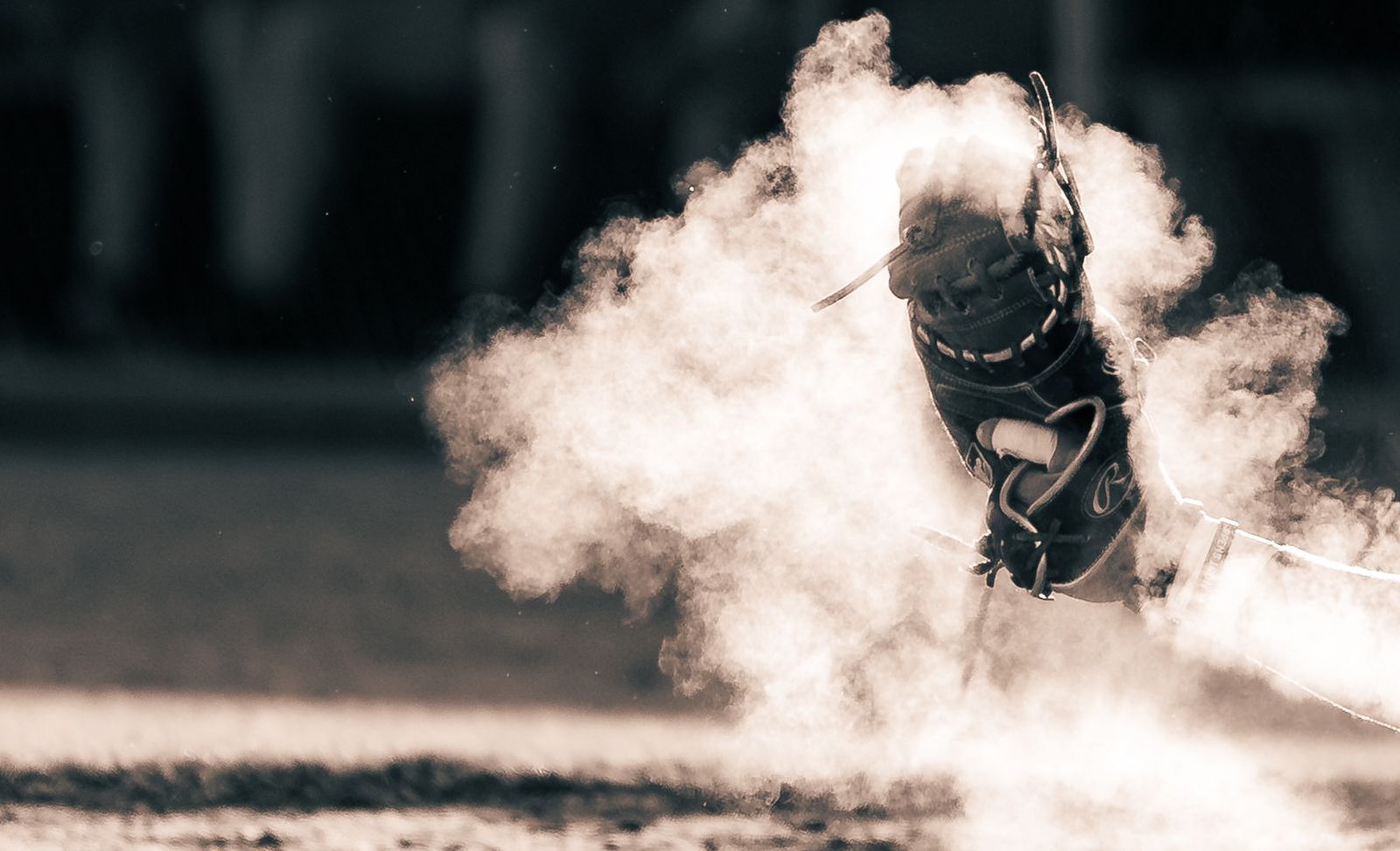 Sliding runner disappearing into a dust cloud