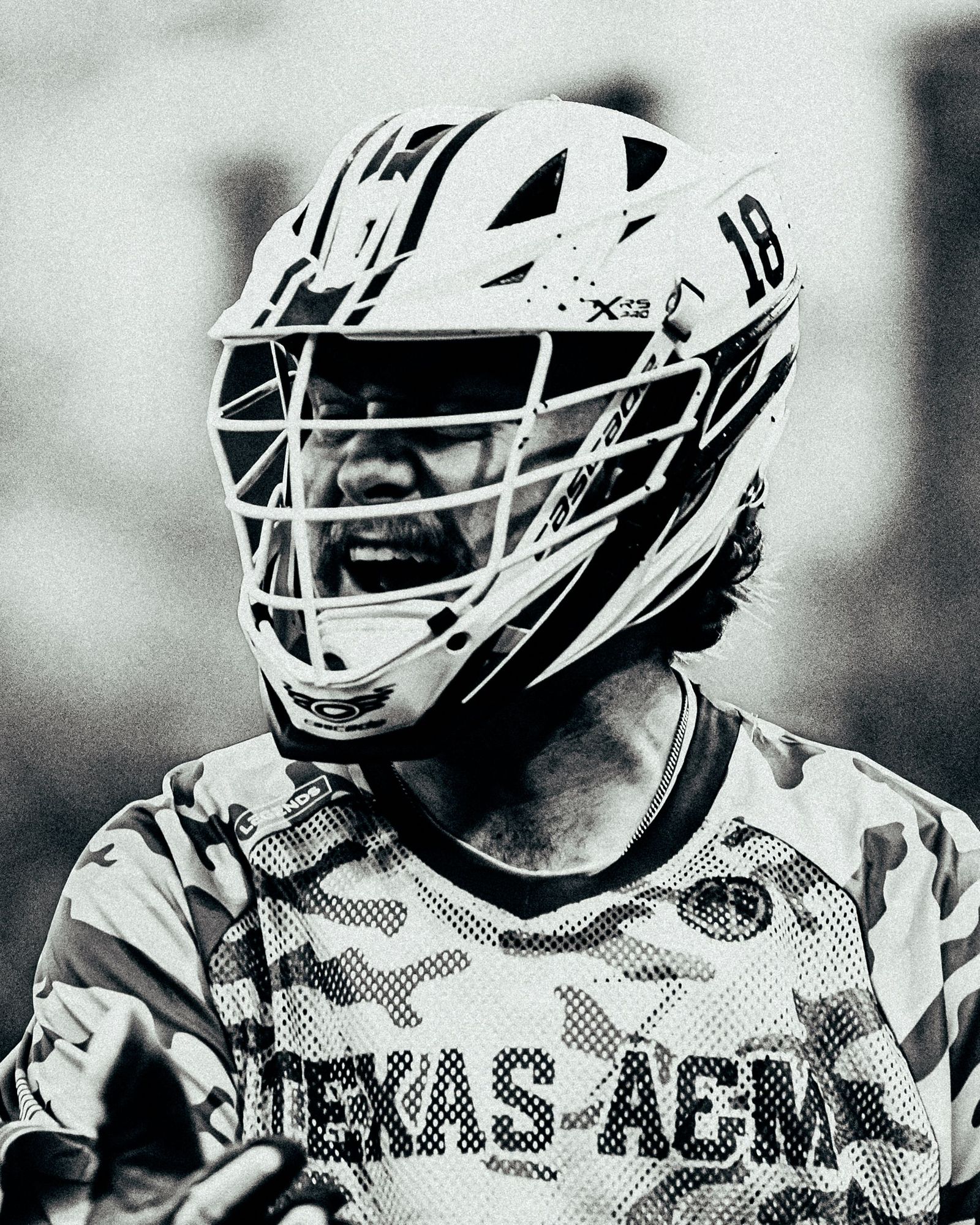 Texas A&M lacrosse helmet and face mask, black and white