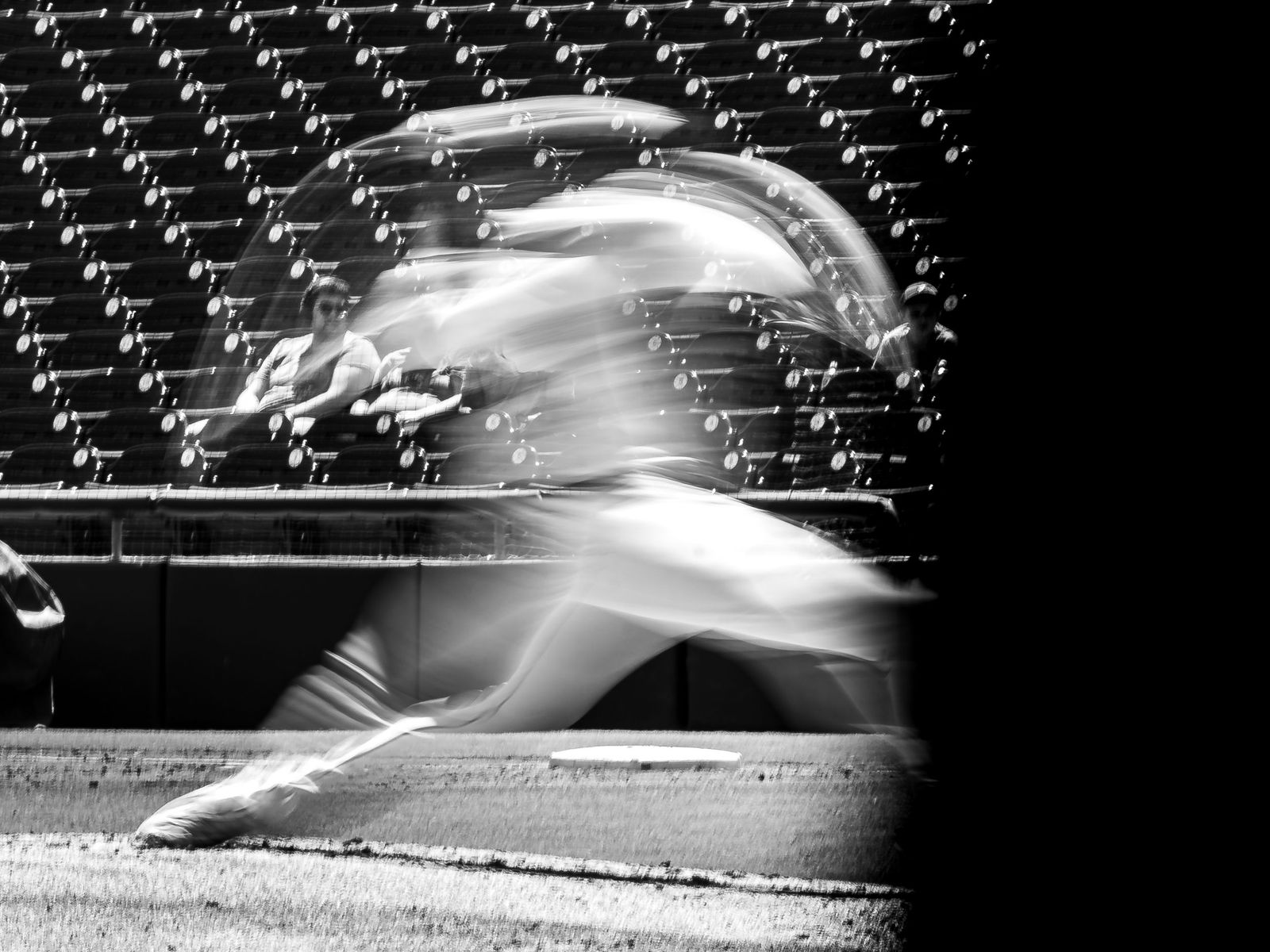 Pitcher in a motion blur, black and white