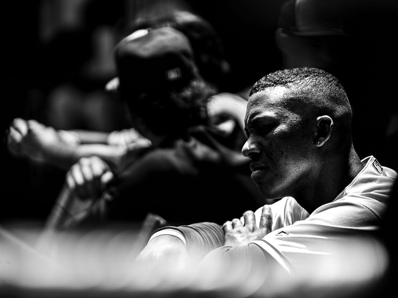 Two players hugging, black and white
