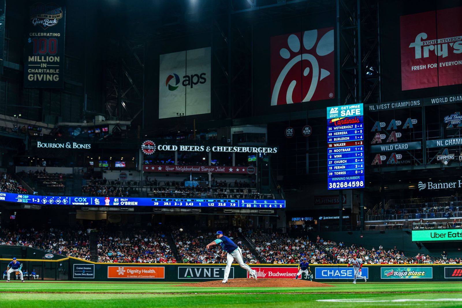 Wide view of a big-league ballpark under the lights