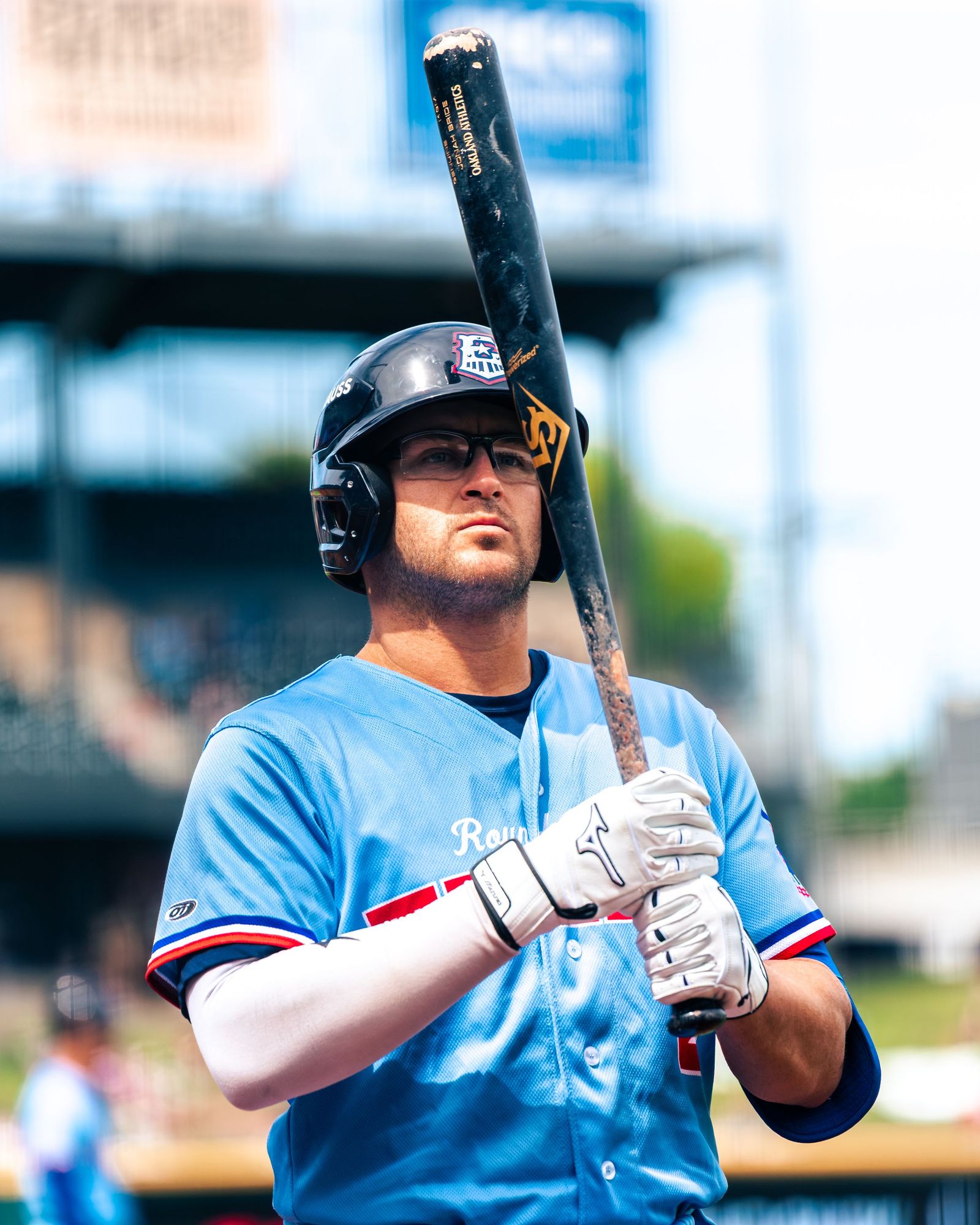 Texas player in light blue with the bat on his shoulder