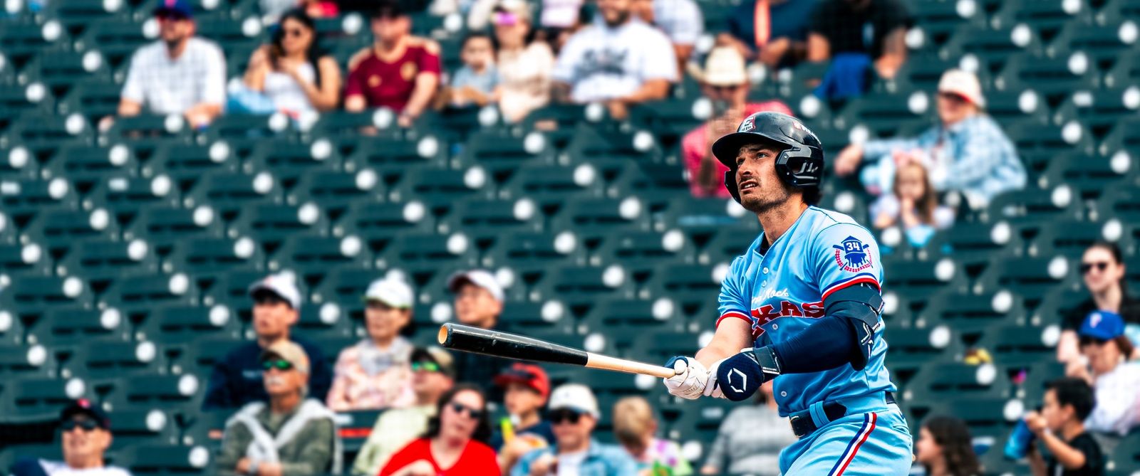 Batter looking up at the stands