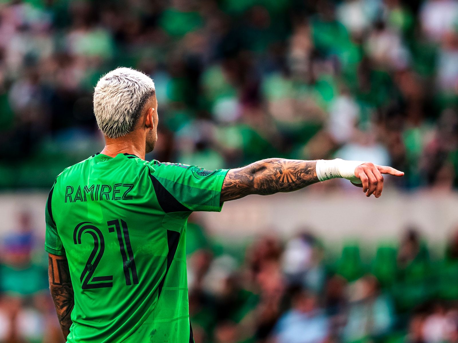 Austin FC player Ramirez pointing to a teammate