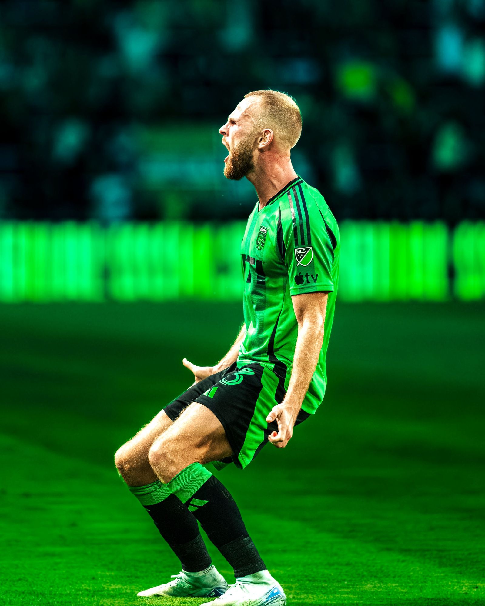 Austin FC player screaming after a goal