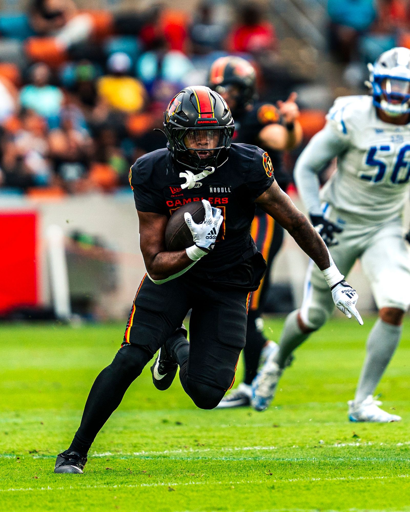 Houston Gamblers ball carrier breaking into the open