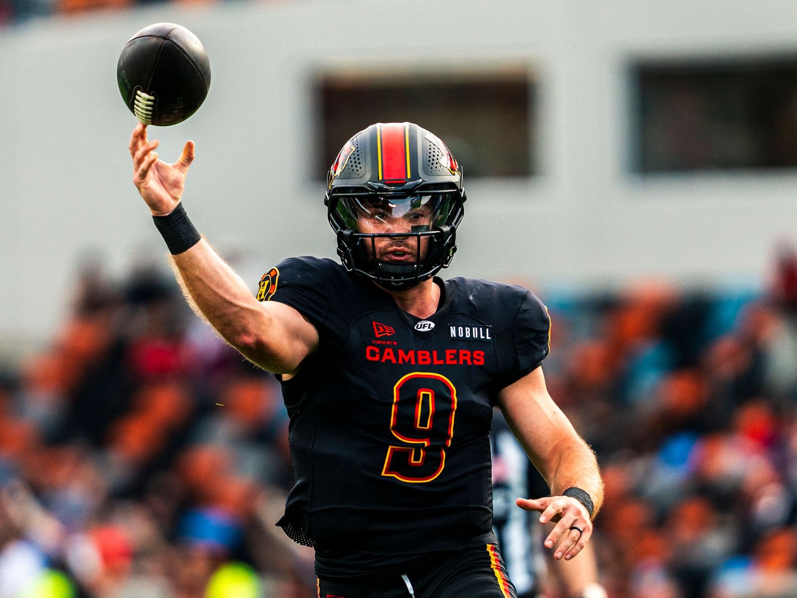 Houston Gamblers quarterback releasing a pass