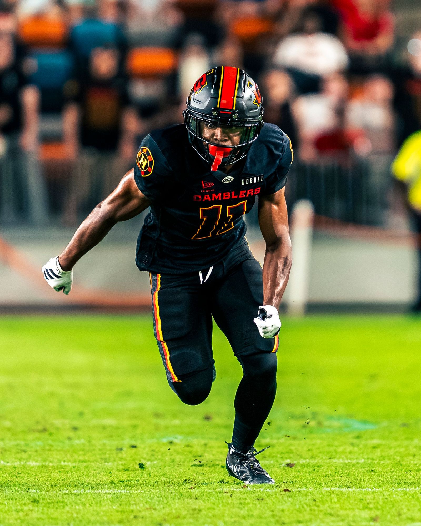 Houston Gamblers ball carrier charging upfield