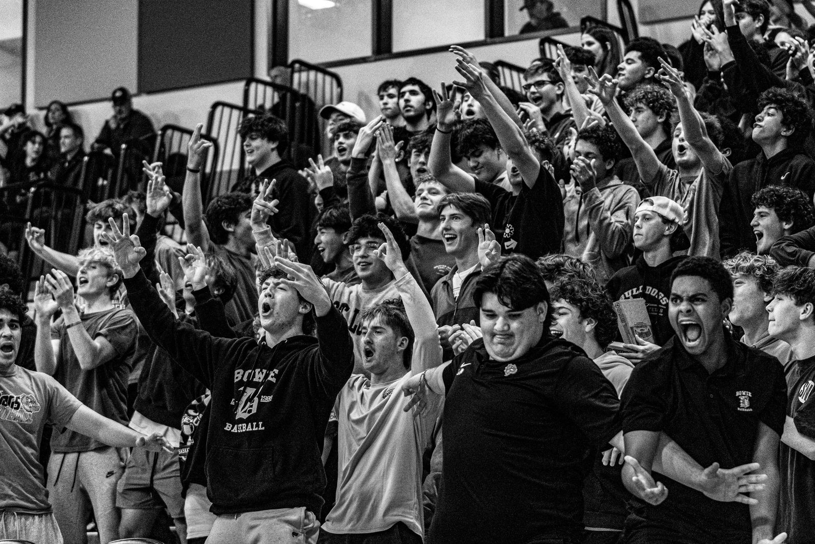 Student section erupting, black and white