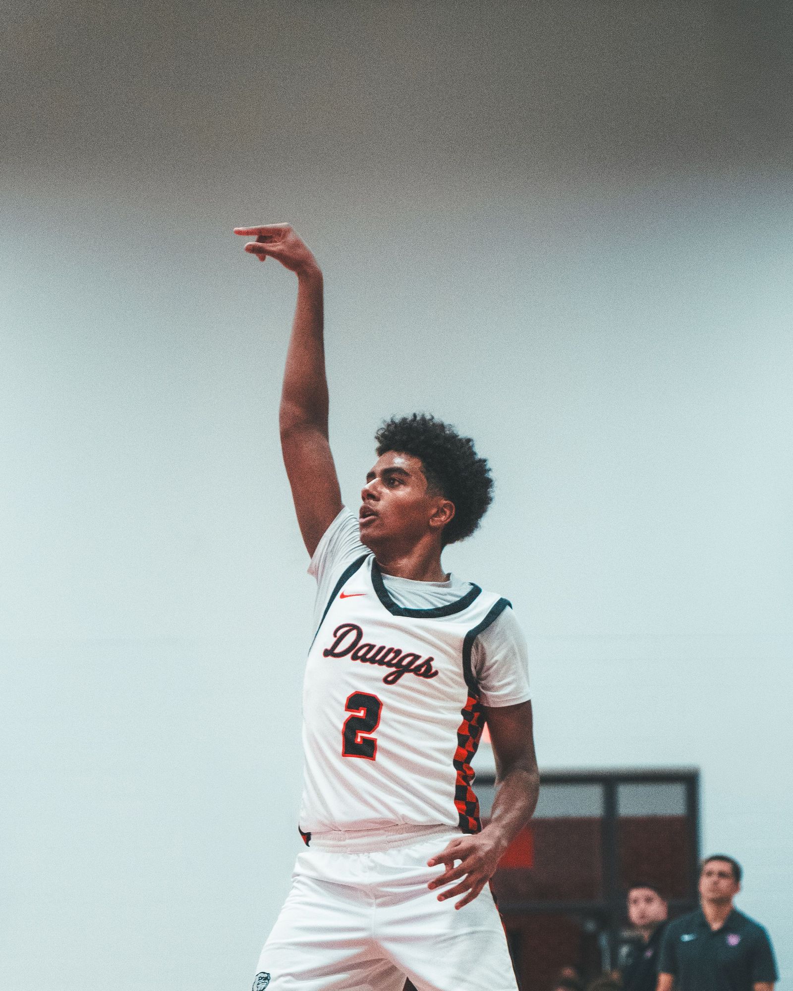 Basketball player following through on a jump shot