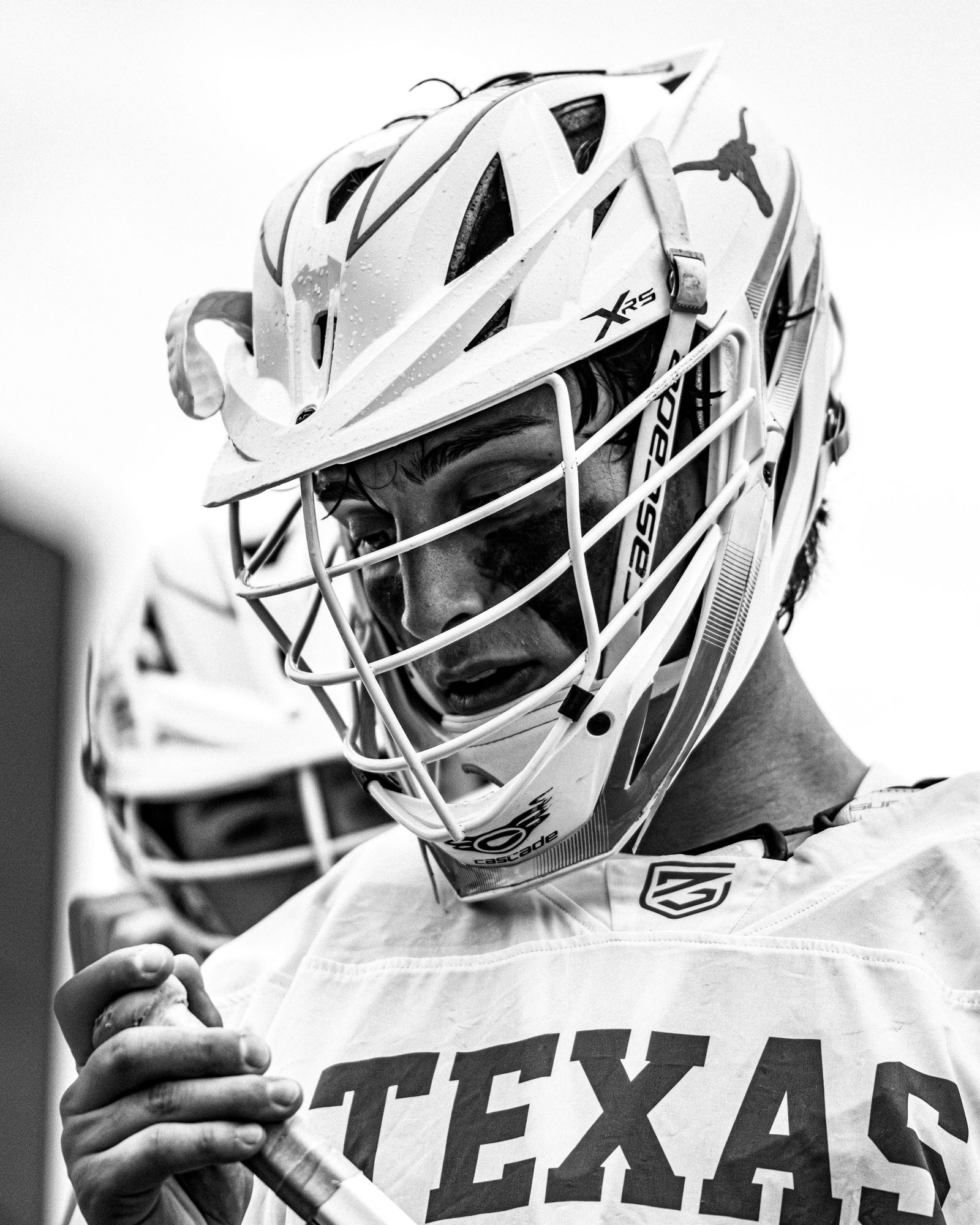 Close view of a Texas lacrosse helmet and face mask