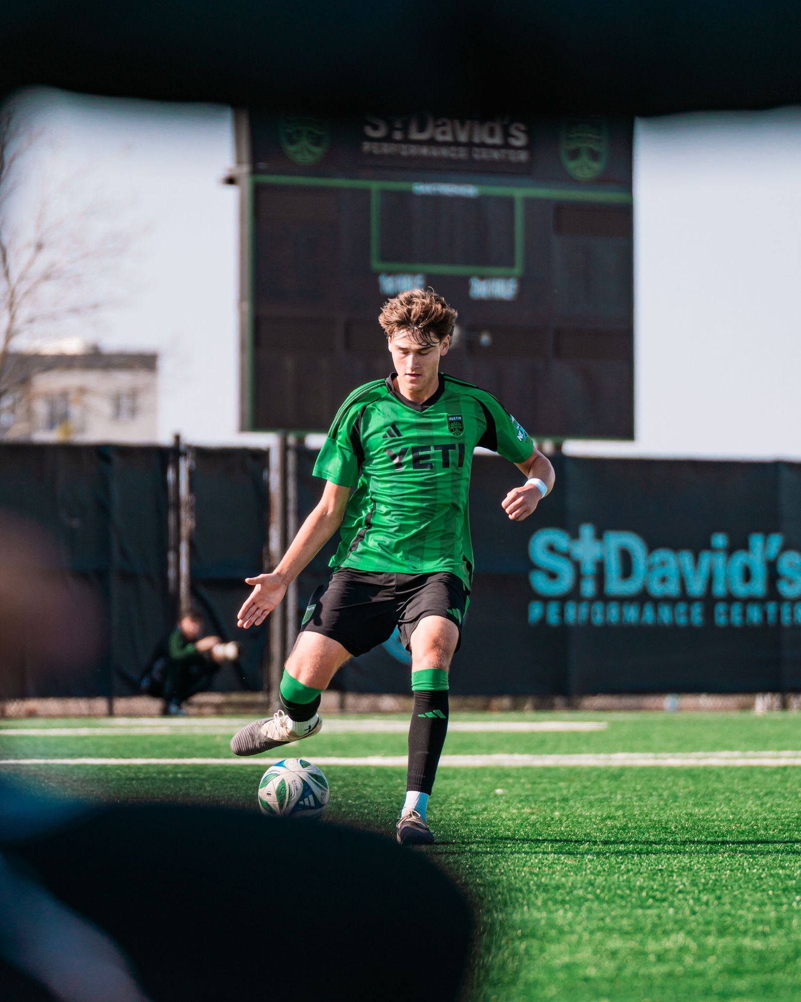Austin FC academy player dribbling