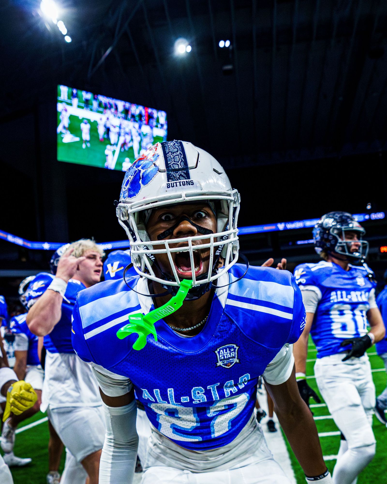 All-star football player screaming into the camera in celebration