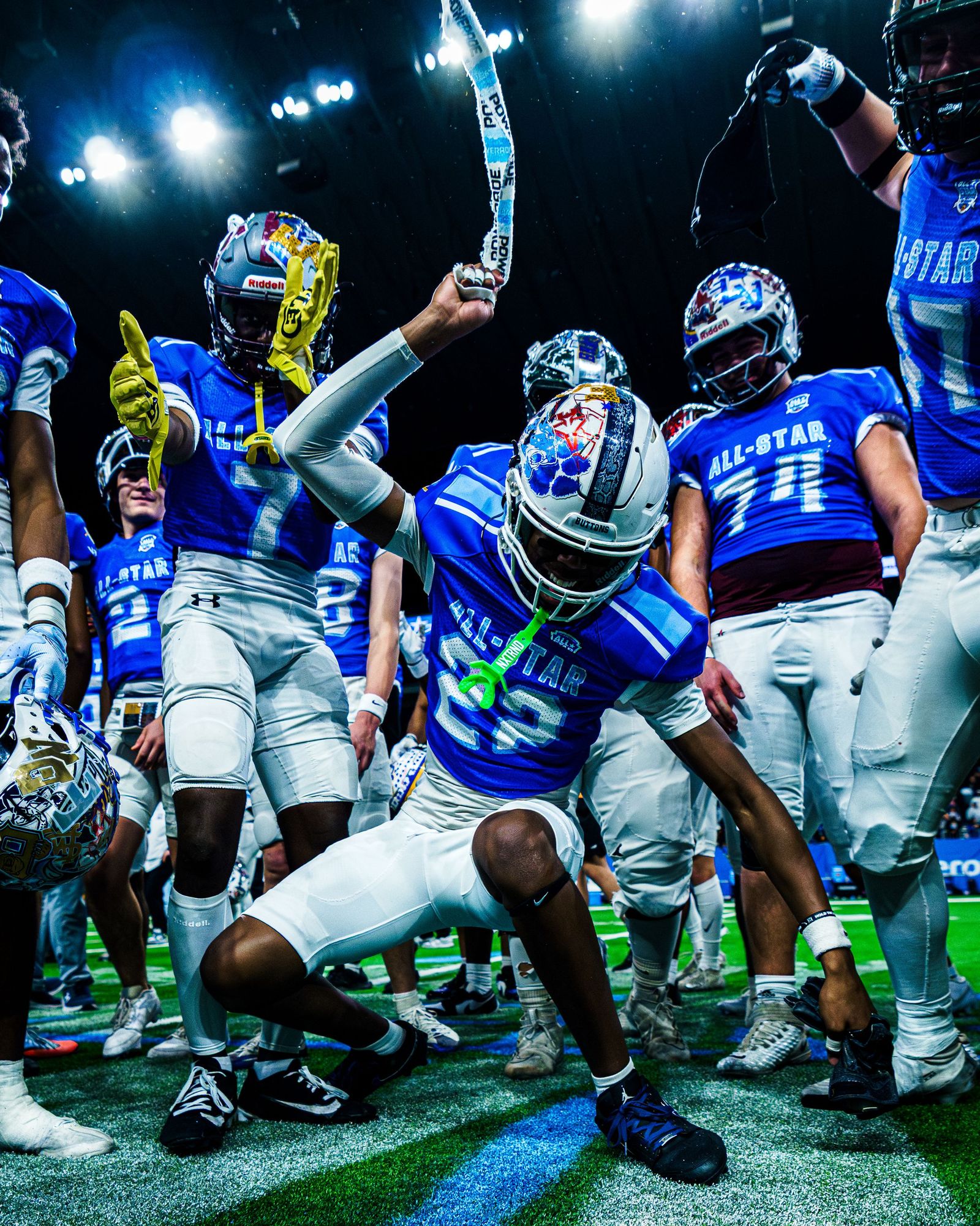 All-star team celebrating on the field